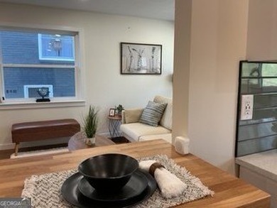 Welcome home! This beautifully remodeled 3-bedroom, 2 bath home on East Lake Golf Club in Georgia - for sale on GolfHomes.com, golf home, golf lot