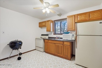 Dreaming of a Pocono escape without the hefty price tag? This on The Hideout Golf in Pennsylvania - for sale on GolfHomes.com, golf home, golf lot