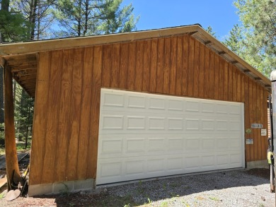 Membership application approval required by Board of Lost Lake on Lost Lake Woods Club in Michigan - for sale on GolfHomes.com, golf home, golf lot