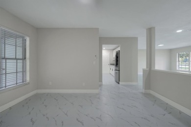 Renovated and Ready for You! This beautifully updated one-story on Wedgefield Golf Club in Florida - for sale on GolfHomes.com, golf home, golf lot