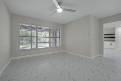 Renovated and Ready for You! This beautifully updated one-story on Wedgefield Golf Club in Florida - for sale on GolfHomes.com, golf home, golf lot
