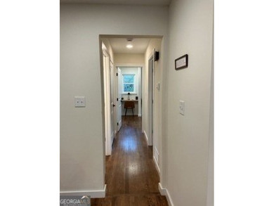 Welcome home! This beautifully remodeled 3-bedroom, 2 bath home on East Lake Golf Club in Georgia - for sale on GolfHomes.com, golf home, golf lot