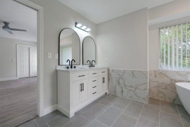 Renovated and Ready for You! This beautifully updated one-story on Wedgefield Golf Club in Florida - for sale on GolfHomes.com, golf home, golf lot