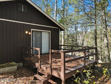 Dreaming of a Pocono escape without the hefty price tag? This on The Hideout Golf in Pennsylvania - for sale on GolfHomes.com, golf home, golf lot