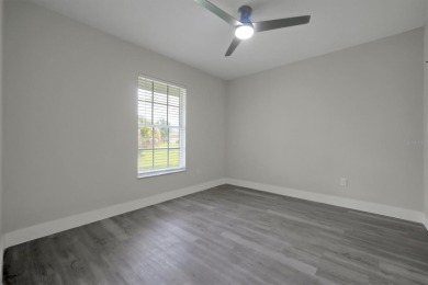 Renovated and Ready for You! This beautifully updated one-story on Wedgefield Golf Club in Florida - for sale on GolfHomes.com, golf home, golf lot