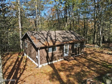 Dreaming of a Pocono escape without the hefty price tag? This on The Hideout Golf in Pennsylvania - for sale on GolfHomes.com, golf home, golf lot