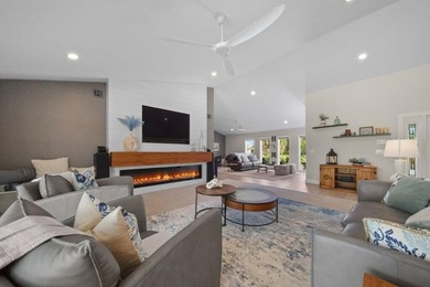 This 4BR/3BA CBS pool home sits on a private 1-acre cul-de-sac on Evergreen Club in Florida - for sale on GolfHomes.com, golf home, golf lot