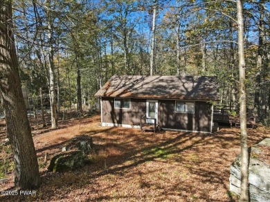 Dreaming of a Pocono escape without the hefty price tag? This on The Hideout Golf in Pennsylvania - for sale on GolfHomes.com, golf home, golf lot