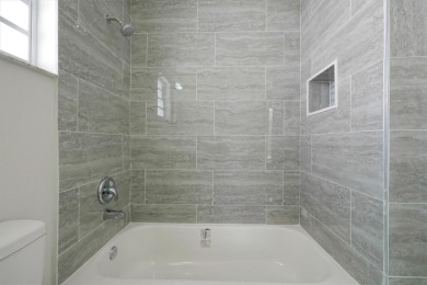 Renovated and Ready for You! This beautifully updated one-story on Wedgefield Golf Club in Florida - for sale on GolfHomes.com, golf home, golf lot