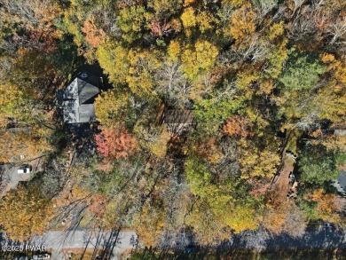Dreaming of a Pocono escape without the hefty price tag? This on The Hideout Golf in Pennsylvania - for sale on GolfHomes.com, golf home, golf lot