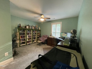 This lovely 5 bedroom, 3 full baths with a first floor primary on Olde Liberty Golf and Country Club in North Carolina - for sale on GolfHomes.com, golf home, golf lot