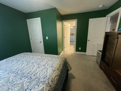 This lovely 5 bedroom, 3 full baths with a first floor primary on Olde Liberty Golf and Country Club in North Carolina - for sale on GolfHomes.com, golf home, golf lot