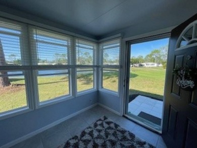 Stunning view from this home on the eleventh tee box of the Golf on Lake Fairways Country Club in Florida - for sale on GolfHomes.com, golf home, golf lot