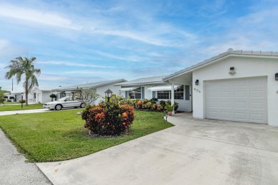 ROOF is 2018! Enjoy every sunny day in this delightful villa on Leisureville Community Golf Course in Florida - for sale on GolfHomes.com, golf home, golf lot