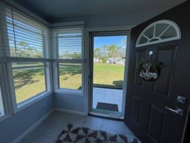 Stunning view from this home on the eleventh tee box of the Golf on Lake Fairways Country Club in Florida - for sale on GolfHomes.com, golf home, golf lot