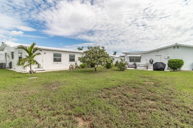 ROOF is 2018! Enjoy every sunny day in this delightful villa on Leisureville Community Golf Course in Florida - for sale on GolfHomes.com, golf home, golf lot