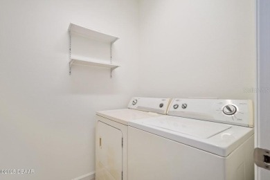 Beautiful villa located in the desirable LPGA Premier on LPGA International Golf Course in Florida - for sale on GolfHomes.com, golf home, golf lot