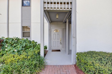 HIGHLY SOUGHT AFTER COURTSIDE 2 BEDROOM, 2 BATHROOM GROUND FLOOR on Boca West Golf and Country Club in Florida - for sale on GolfHomes.com, golf home, golf lot