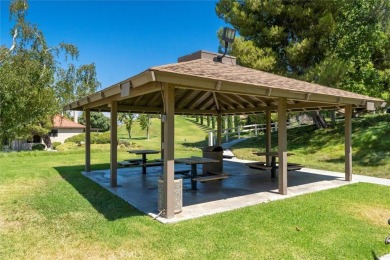 Discover this charming 2-bedroom, 2-bath home with an attached on Friendly Valley Golf Course in California - for sale on GolfHomes.com, golf home, golf lot