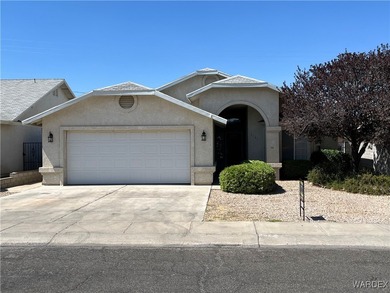Welcome home to comfort, style, and a fantastic central Kingman on Cerbat Cliffs Golf Course in Arizona - for sale on GolfHomes.com, golf home, golf lot