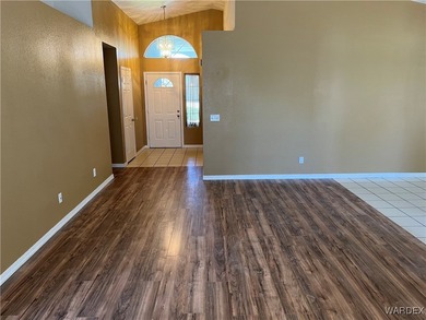 Welcome home to comfort, style, and a fantastic central Kingman on Cerbat Cliffs Golf Course in Arizona - for sale on GolfHomes.com, golf home, golf lot