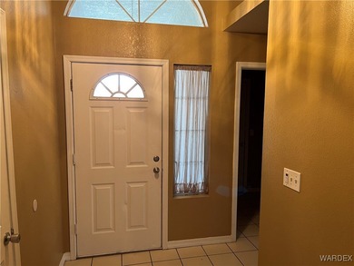 Welcome home to comfort, style, and a fantastic central Kingman on Cerbat Cliffs Golf Course in Arizona - for sale on GolfHomes.com, golf home, golf lot