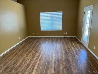 Welcome home to comfort, style, and a fantastic central Kingman on Cerbat Cliffs Golf Course in Arizona - for sale on GolfHomes.com, golf home, golf lot