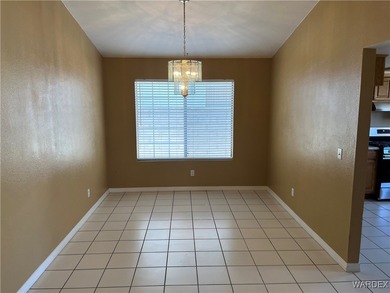 Welcome home to comfort, style, and a fantastic central Kingman on Cerbat Cliffs Golf Course in Arizona - for sale on GolfHomes.com, golf home, golf lot