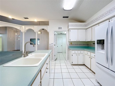 Welcome to this beautifully maintained home located in the on Monarch At Royal Highlands in Florida - for sale on GolfHomes.com, golf home, golf lot