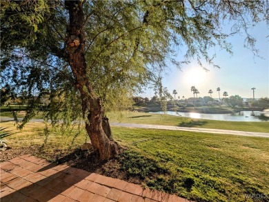 Gorgeous Golf Course Home. View of the pond and the lush green on Riverview Golf Course in Arizona - for sale on GolfHomes.com, golf home, golf lot