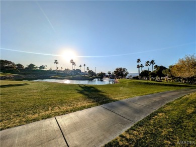 Gorgeous Golf Course Home. View of the pond and the lush green on Riverview Golf Course in Arizona - for sale on GolfHomes.com, golf home, golf lot