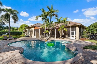 Prepare to be impressed! This spacious 5-bedroom, 3-bath, 3-car on Hammock Creek Golf Club in Florida - for sale on GolfHomes.com, golf home, golf lot