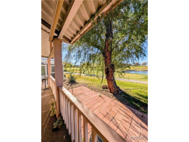 Gorgeous Golf Course Home. View of the pond and the lush green on Riverview Golf Course in Arizona - for sale on GolfHomes.com, golf home, golf lot