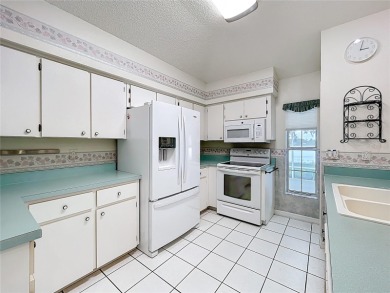 Welcome to this beautifully maintained home located in the on Monarch At Royal Highlands in Florida - for sale on GolfHomes.com, golf home, golf lot