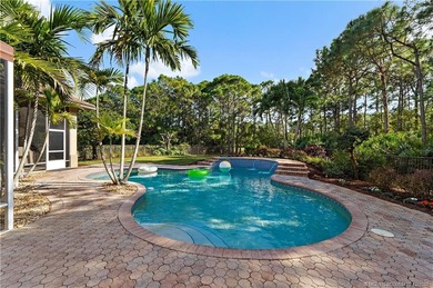 Prepare to be impressed! This spacious 5-bedroom, 3-bath, 3-car on Hammock Creek Golf Club in Florida - for sale on GolfHomes.com, golf home, golf lot