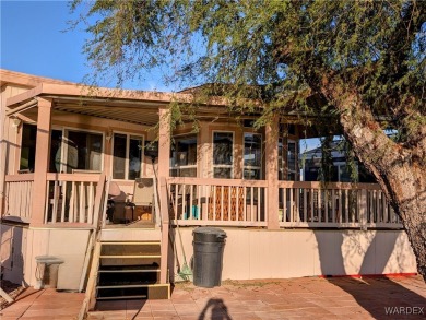 Gorgeous Golf Course Home. View of the pond and the lush green on Riverview Golf Course in Arizona - for sale on GolfHomes.com, golf home, golf lot