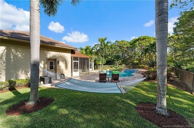 Prepare to be impressed! This spacious 5-bedroom, 3-bath, 3-car on Hammock Creek Golf Club in Florida - for sale on GolfHomes.com, golf home, golf lot