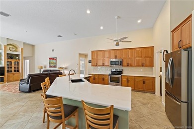 Prepare to be impressed! This spacious 5-bedroom, 3-bath, 3-car on Hammock Creek Golf Club in Florida - for sale on GolfHomes.com, golf home, golf lot