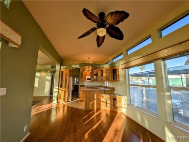 Gorgeous Golf Course Home. View of the pond and the lush green on Riverview Golf Course in Arizona - for sale on GolfHomes.com, golf home, golf lot