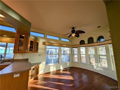 Gorgeous Golf Course Home. View of the pond and the lush green on Riverview Golf Course in Arizona - for sale on GolfHomes.com, golf home, golf lot