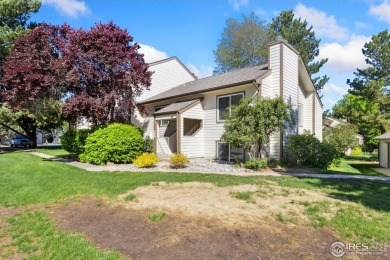 Enjoy easy main-floor living in this 2-bedroom, 1-bath end-unit on Collindale Golf Course in Colorado - for sale on GolfHomes.com, golf home, golf lot