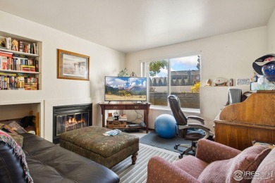Enjoy easy main-floor living in this 2-bedroom, 1-bath end-unit on Collindale Golf Course in Colorado - for sale on GolfHomes.com, golf home, golf lot