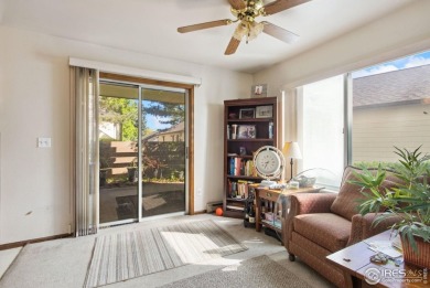 Enjoy easy main-floor living in this 2-bedroom, 1-bath end-unit on Collindale Golf Course in Colorado - for sale on GolfHomes.com, golf home, golf lot