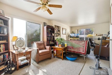 Enjoy easy main-floor living in this 2-bedroom, 1-bath end-unit on Collindale Golf Course in Colorado - for sale on GolfHomes.com, golf home, golf lot