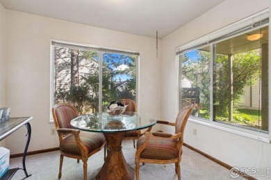 Enjoy easy main-floor living in this 2-bedroom, 1-bath end-unit on Collindale Golf Course in Colorado - for sale on GolfHomes.com, golf home, golf lot