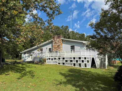 This lovely two-bedroom, two-bathroom home is conveniently on The Course At Turkey Mountain in Arkansas - for sale on GolfHomes.com, golf home, golf lot