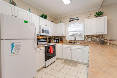 Fully furnished, third floor end unit condo located in Magnolia on Myrtlewood Golf Course and Club  in South Carolina - for sale on GolfHomes.com, golf home, golf lot