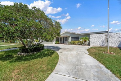 Under contract-accepting backup offers. Beautiful spacious on Baypoint Golf Club in Florida - for sale on GolfHomes.com, golf home, golf lot