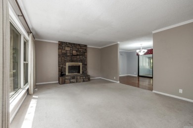 Don't miss this one!  Large living room with picture window and on Cortez Golf Course in Arkansas - for sale on GolfHomes.com, golf home, golf lot