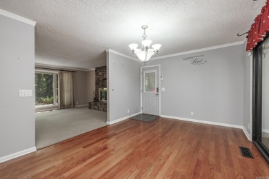 Don't miss this one!  Large living room with picture window and on Cortez Golf Course in Arkansas - for sale on GolfHomes.com, golf home, golf lot